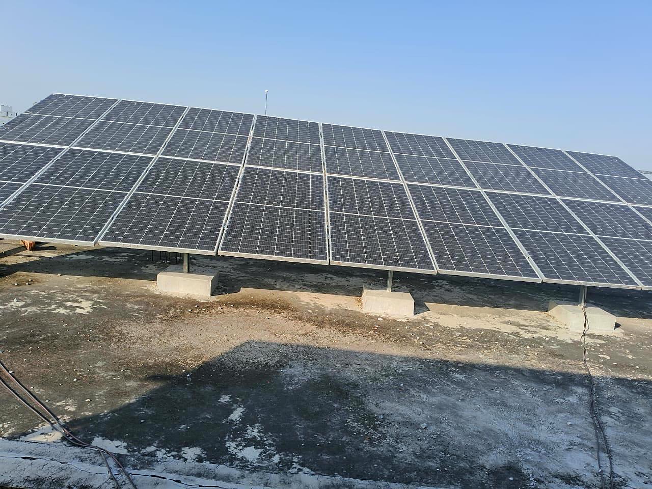 Close-up view of a high-efficiency solar panel array under clear sky